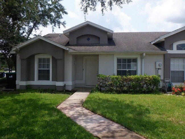 Building Photo - 3/2 Villa Located in Desirable S. Orlando ...