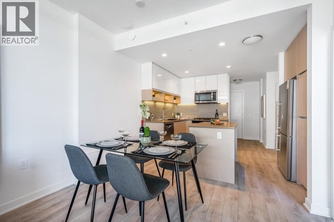 Photo - 8850 University Crescent Unit 11xx