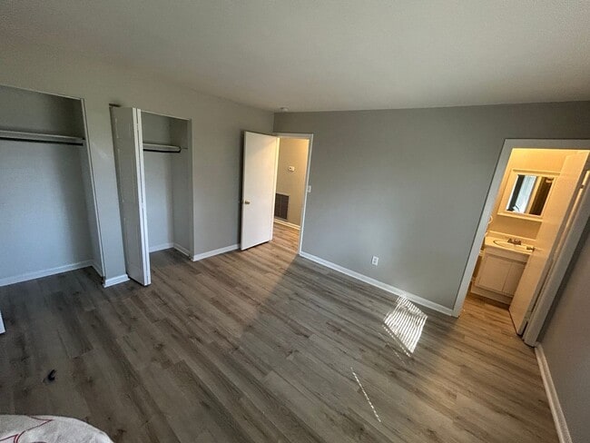 Photo - Charming 3BR Home with Fenced Backyard, Garage & Modern Flooring — 1,322 Sq Ft