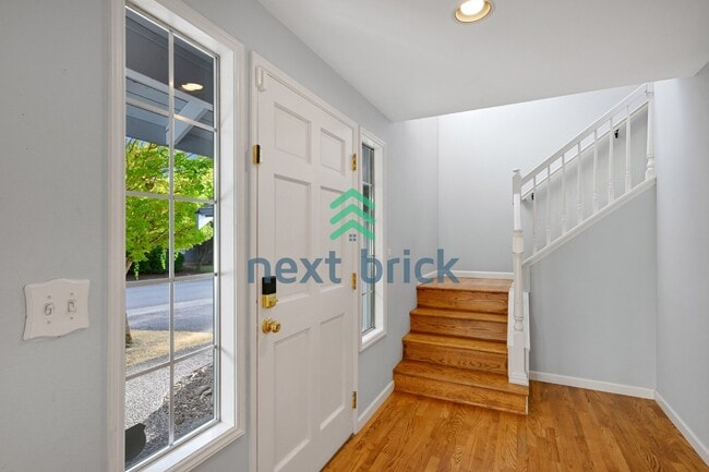 Photo - "Spacious 4-Bedroom Retreat with 2.5 Baths in Charming Sammamish Setting"