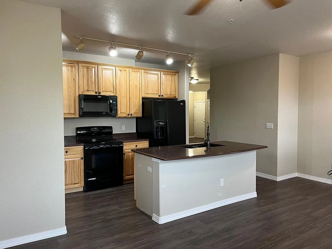 Building Photo - 15455 Canyon Rim Dr Unit 207