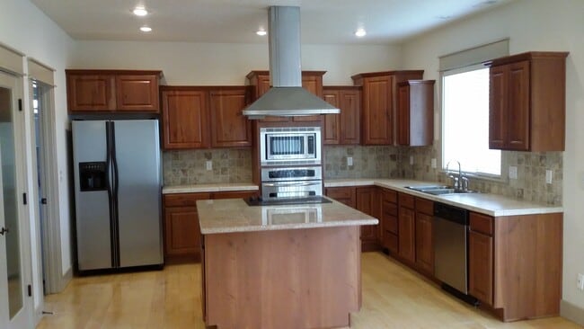 Photo - Three bedrooms plus an office.. Gorgeous home in Pepper Hills with tandem 3 car garage. Newer car...