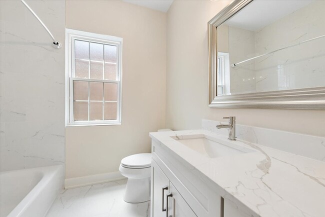 Full Bathroom with tub - 5028 N Mozart St Unit #2