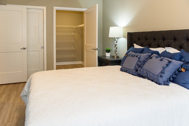 Master bedroom with large walk-in closet and ensuite full bathroom
