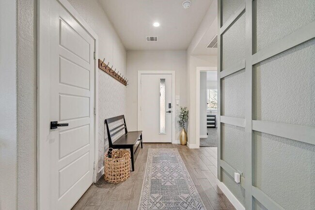 Photo - "Energy-Efficient 4-2 Home with Designer Finishes and a Spacious Backyard Retreat!"