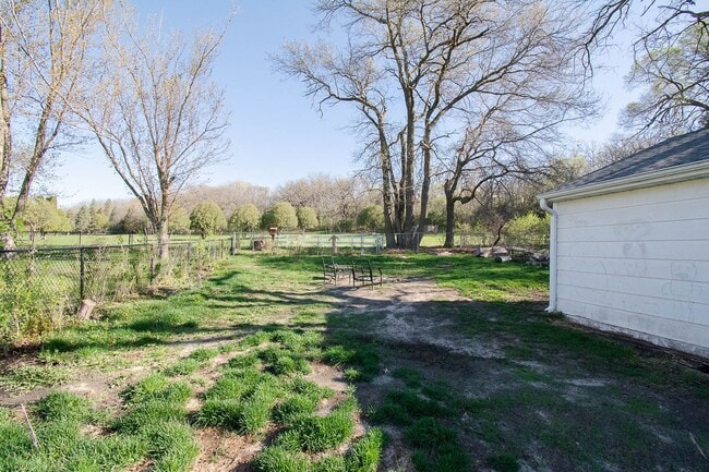 Photo - Fenced Yard, 2-Car Garage + Internet Included