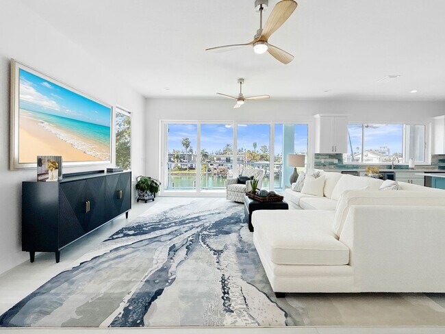 Photo - Waterfront Johns Pass Luxury | Steps to Beach + Pool, Hot Tub & Dock