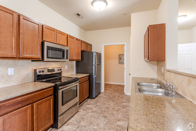 3BR, 2BA - 1,377SF Hurley - Kitchen - Birchfield at Millstone Towne Center Apartments