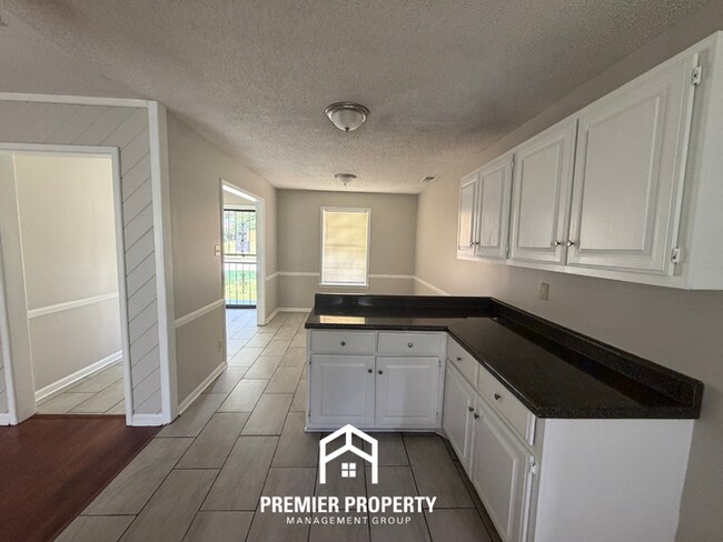 Photo - Charming 4BR/2BA Raleigh Home | 1,414 Sq Ft, Hardwood Floors & Fenced Backyard