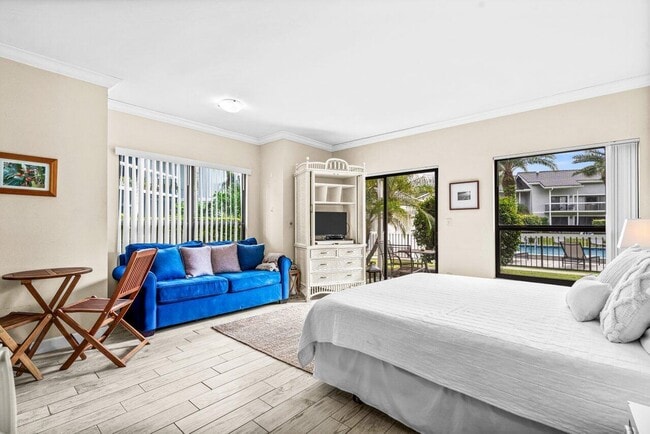 Building Photo - 11863 Wimbledon Cir Unit 432