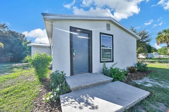 Building Photo - 6385 86th Ln