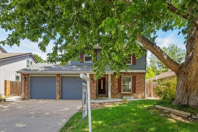 Building Photo - Spacious 4BR Home with Finished Basement, Private Yard & Community Amenities