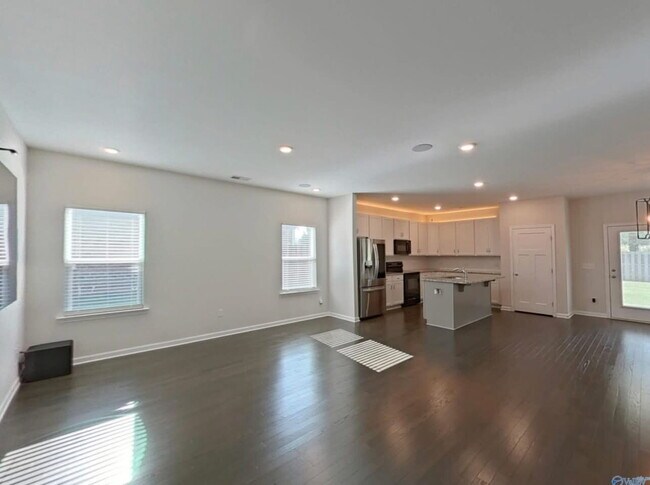 "Charming 3-Bed Oasis with Granite Touches & Hardwood Elegance and loads of high tech upgrades in...