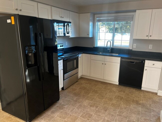 Photo - New carpet, kitchen, appliances, paint! Great neighborhood.