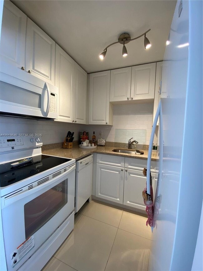 Building Photo - 5050 NW 7th St Unit 312