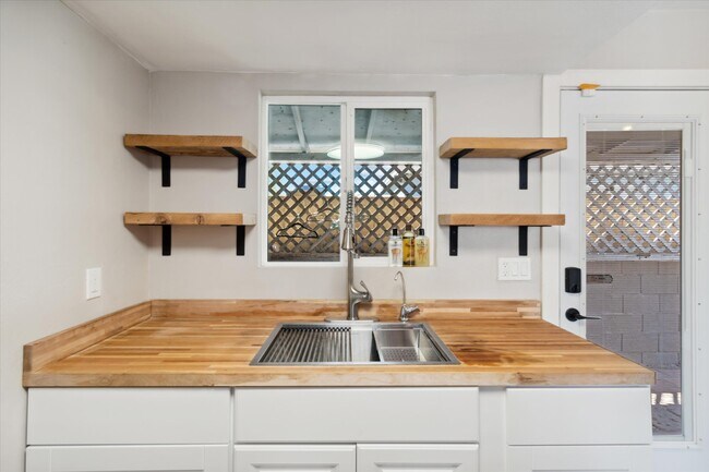 plenty of cabinet and shelf space in the kitchen - 327 N 16th Ave Unit Apt A