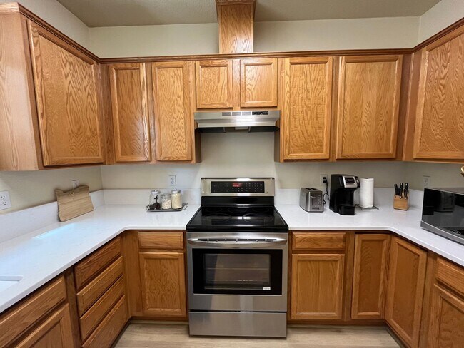 Photo - Chic and Spacious: 3-Bed Townhome with Pri...