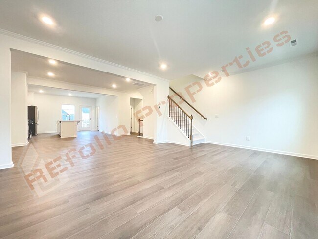 Photo - Brand New 3 Story, 4 bedroom, 3.5 bathroom Townhome Featuring a 1st floor Guest Suite, 2 Car Gara...