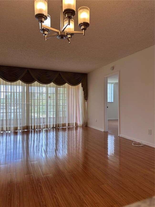 Building Photo - 5860 NW 64th Ave Unit 203 Rental