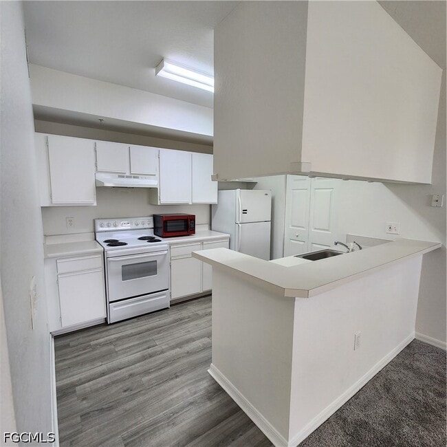 Building Photo - 6321 Aragon Way Unit 304