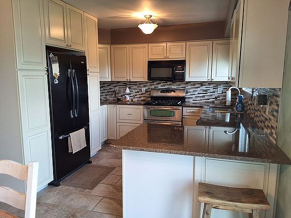 Photo - 12042 W 103rd Ct