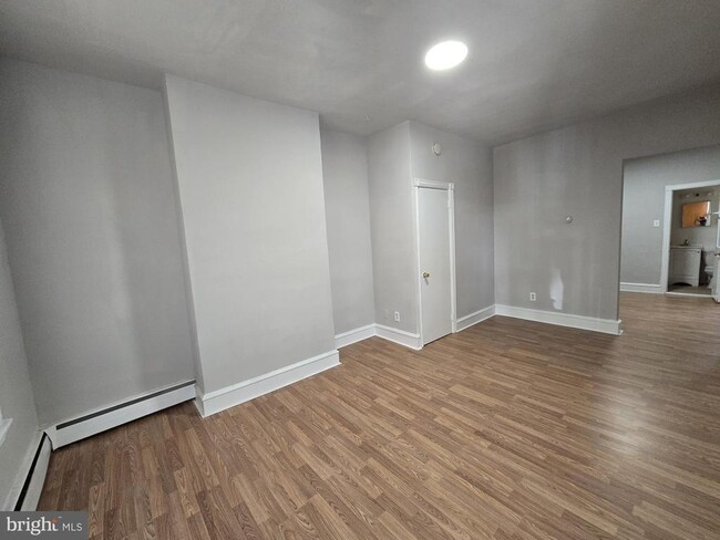 Building Photo - 5709 Leonard St Unit 1ST FL Rental