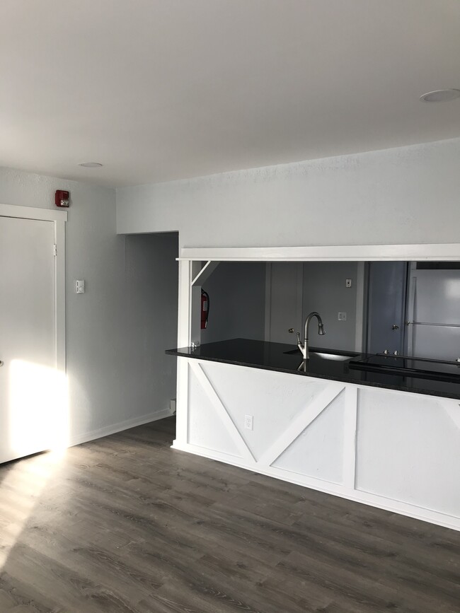View of kitchen from livigroom - 58 Spring St Unit Apt. B