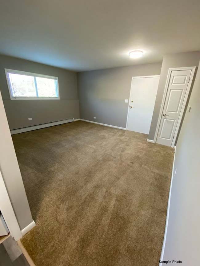 Photo - Carriage House Apartments LLC