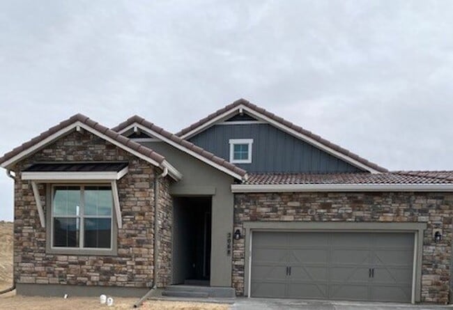 Building Photo - STUNNING 4 BED/4 BATH PATIO HOME IN FLYING HORSE!