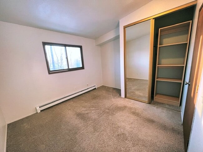 Photo - Spacious & Bright Top Floor Condo in East Anchorage, Close to Base + W/D In Unit!