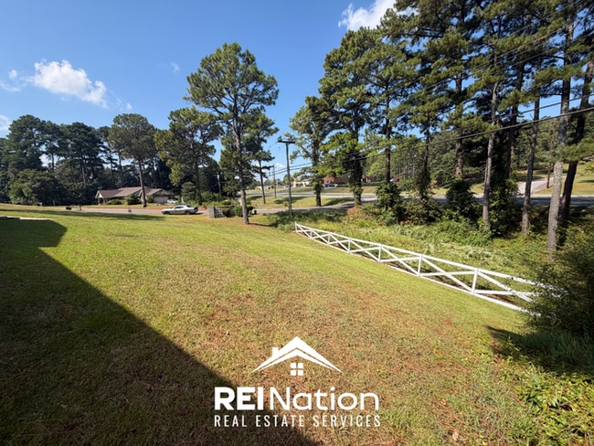 Photo - MASSIVE BESSEMER RENTAL! 4BR/2.5BA | High Ceilings & Brick Fireplace | 2-Car Garage!