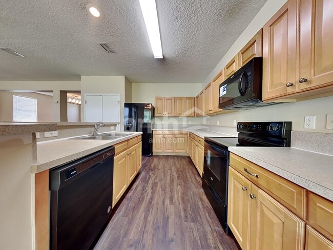 Photo - 11293 Justin Oaks Dr N