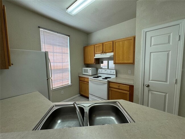 Photo - 9157 Lee Vista Blvd Unit 203