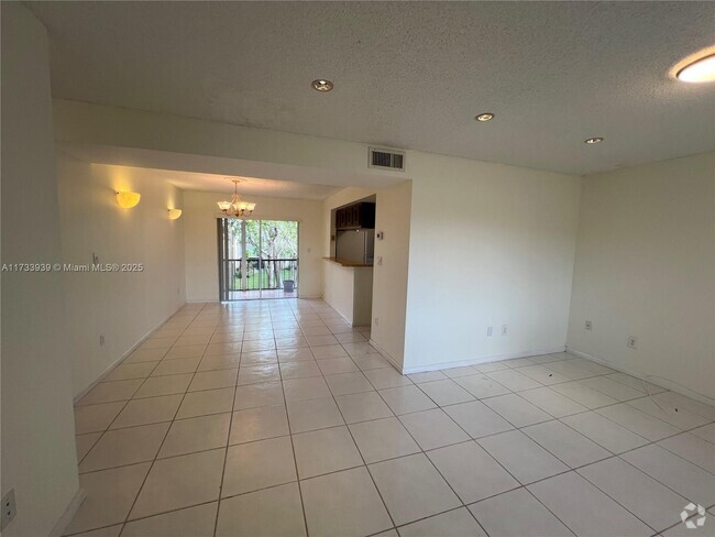 Building Photo - 8401 SW 107th Ave Unit 322E Rental