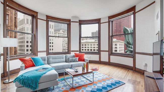 Furnished Living Room with City Views