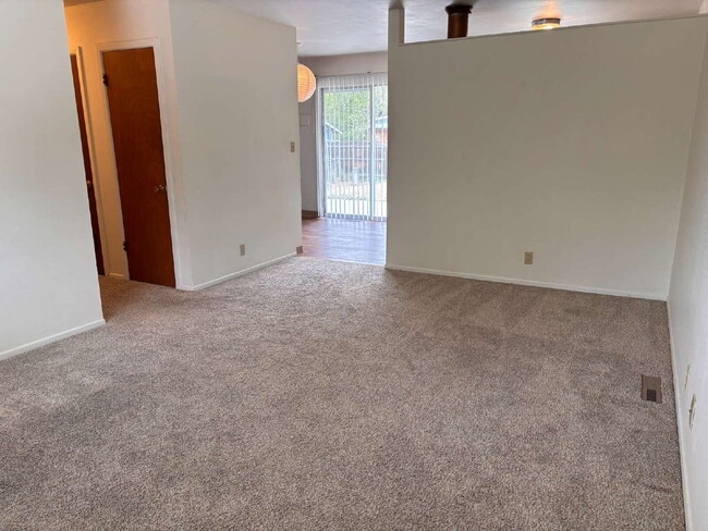 Photo - 3 BR bright, sunny, well-maintained house with large fenced yard and attached garage.