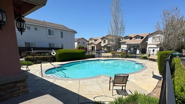 Photo - THREE BEDROOM TWO AND A HALF BATH POOL USE SEE VIDEO