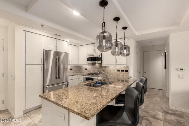 Building Photo - 7131 E Rancho Vista Dr Unit 6010