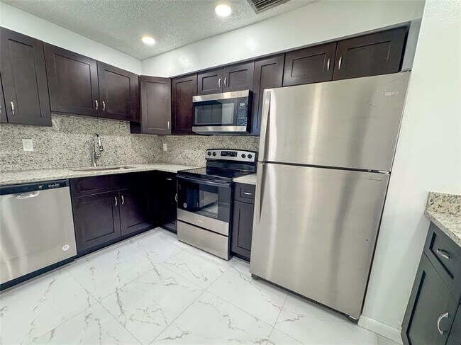 Photo - 10687 Royal Palm Blvd