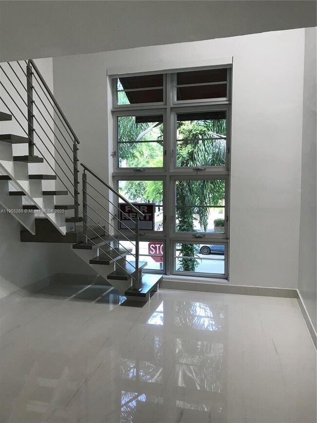 Building Photo - 234 Antiquera Ave Unit 12