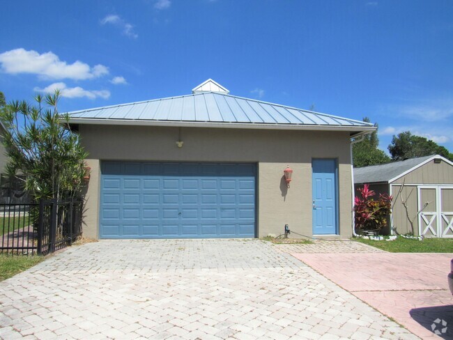 Building Photo - 4150 Royal Palm Beach Blvd Rental