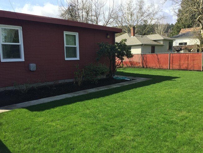 Photo - Crisp Duplex, offstreet parking, great backyard too. Unit 7641