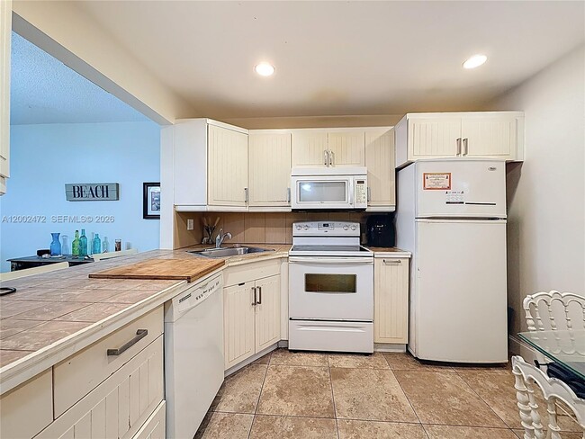 Building Photo - 410 SE 2nd St Unit 115