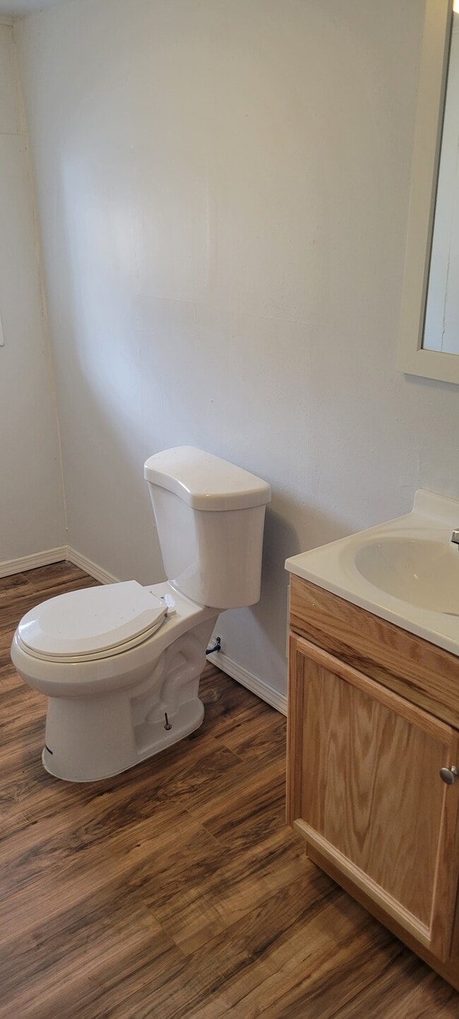 Photo - Two story house with full basement and garage.