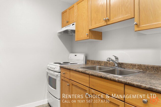 Photo - Main Floor Unit, Assigned Parking, Onsite Laundry, BONUS INCENTIVE