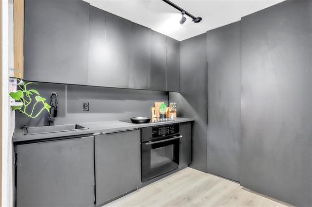 Building Photo - 9821 Walnut St Unit K203 Rental