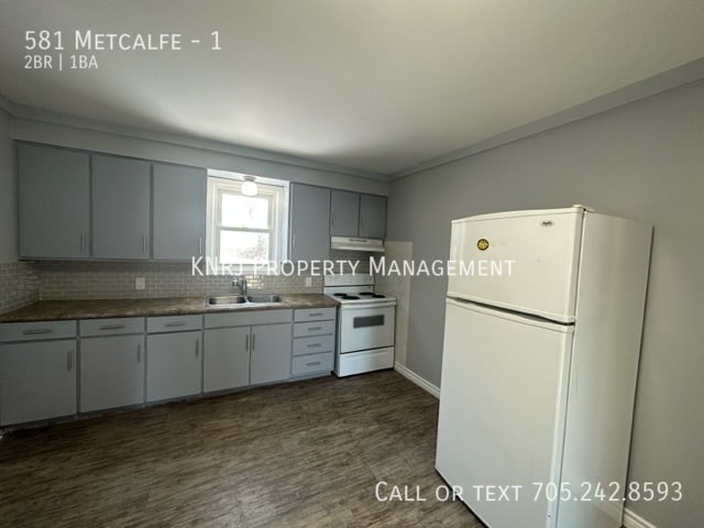 Photo - Two Bedroom Main Floor Apartment Unité 1