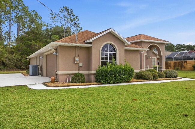 Photo - "Charming 3-Bedroom Home with 2 Full Baths and 2032 Sq Ft of Comfort in Palm Coast!"