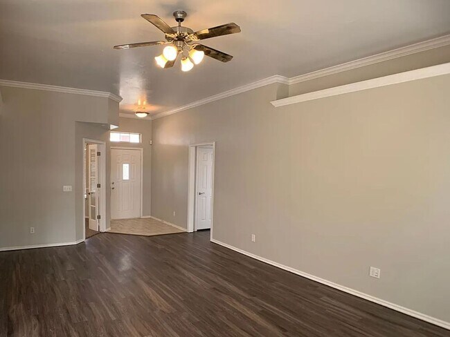 Photo - Spacious 4-Bedroom Home | Fenced Yard & 2-Car Garage