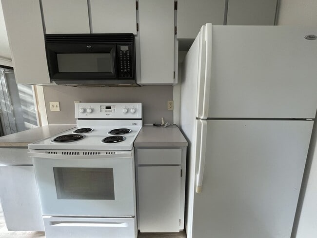 Photo - Spacious 2BD/1.5BA Ground-Floor Apartment with Spacious Bedrooms & Modern Kitchen Layout